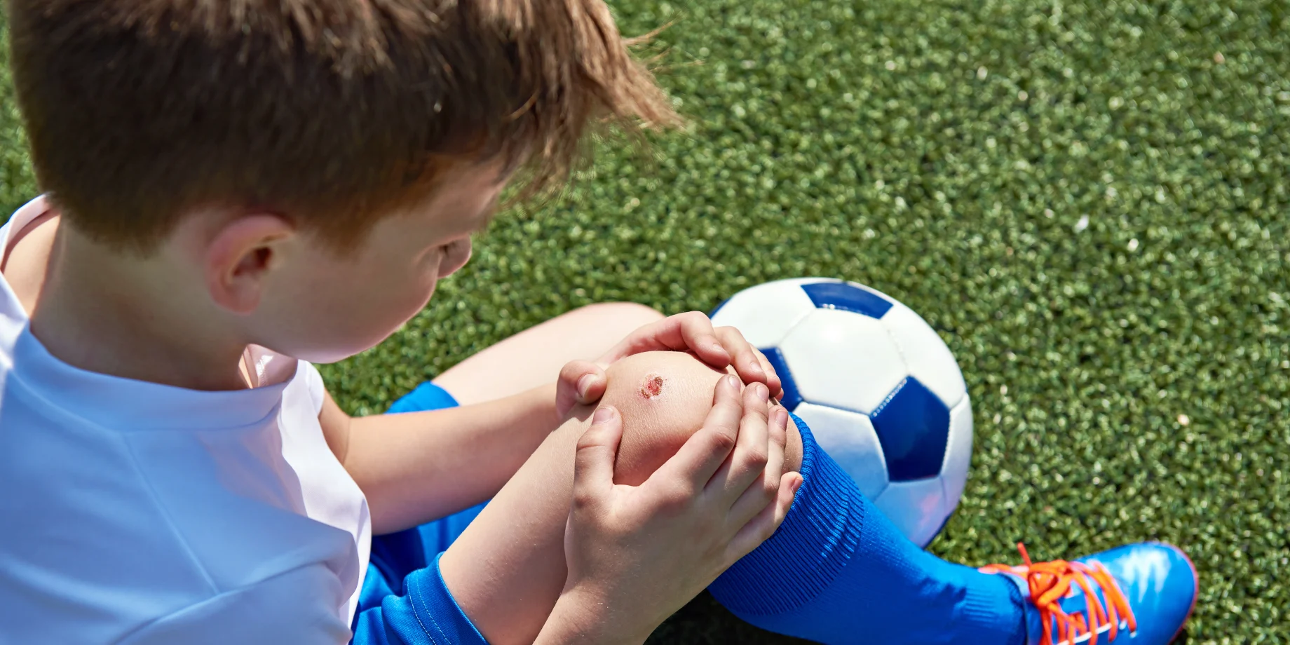 Barn som er kommet til skade til fodbold